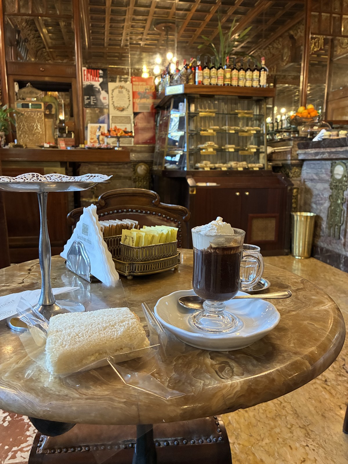 Bicerin drink, tramezzino sandwich, marble table, Turin