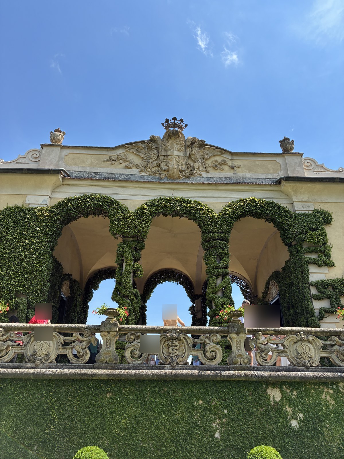 Stone loggia and columns of Villa del Balbianello overlooking Lake Como