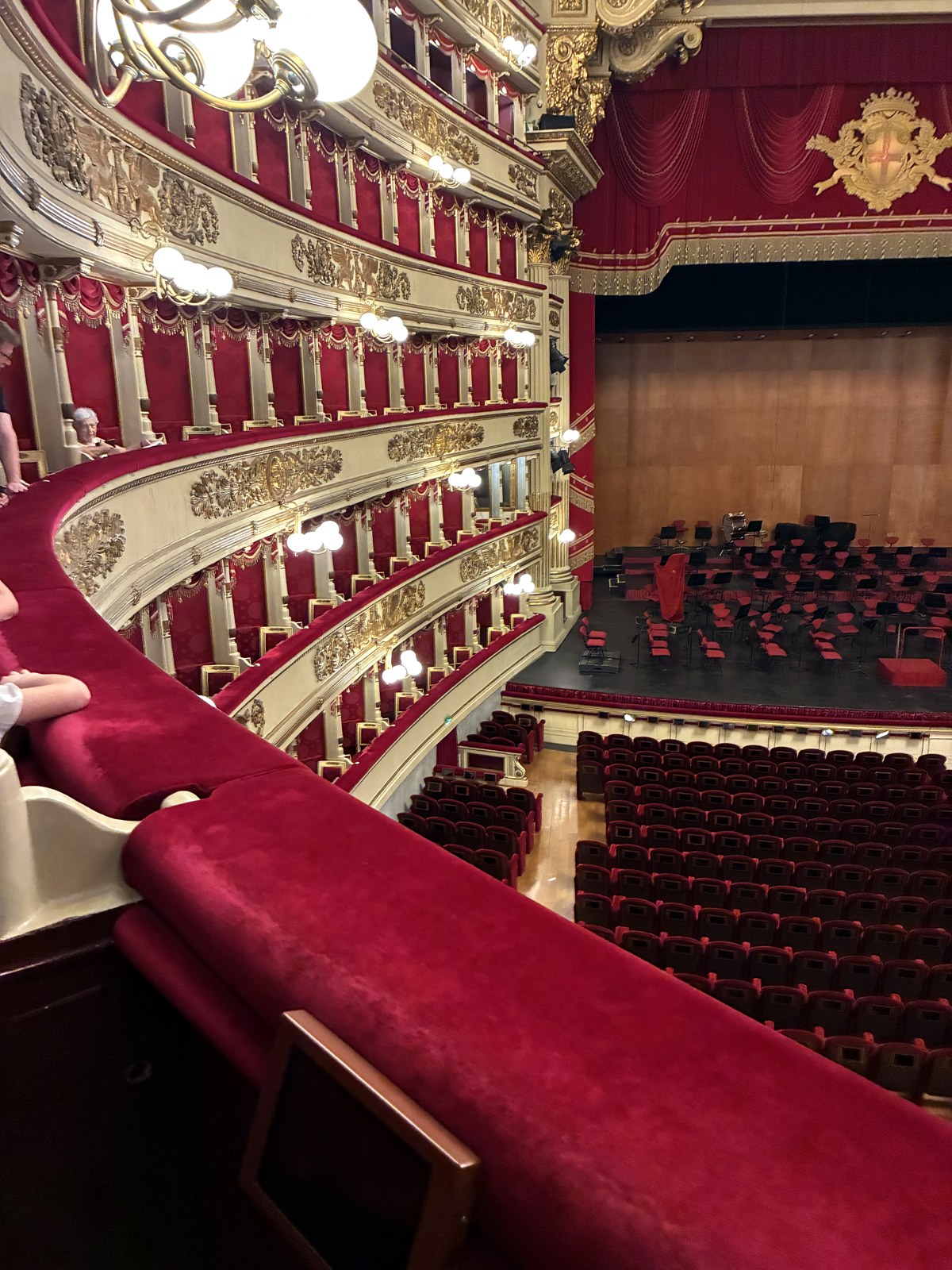 Red velvet tiered boxes of the La Scala auditorium in Milan