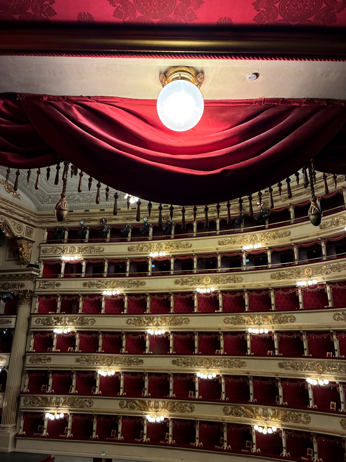 Gilded royal box with chandelier at La Scala, Milan