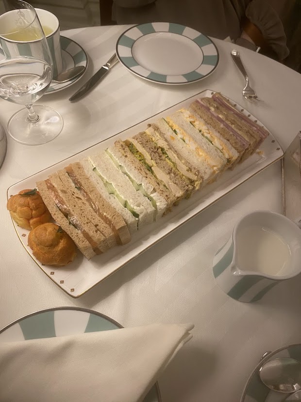 Finger sandwiches on a long plate at Claridge&rsquo;s afternoon tea
