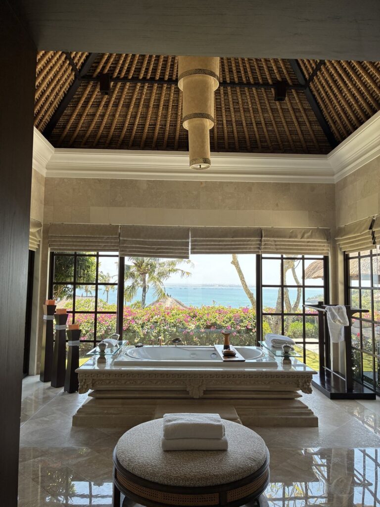 Bathtub facing the garden in an AYANA villa