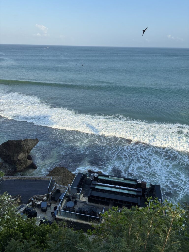 Rock Bar Bali seen from the clifftop in the morning, decks over the surf