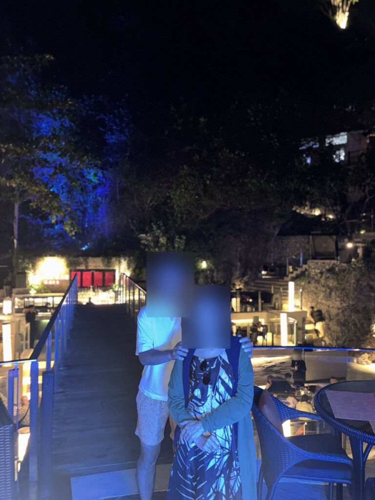 Smart casual outfits on the Rock Bar steps at night